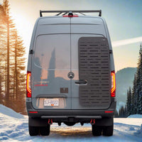 High strength aluminum gear rack mounted on a 2019+ Sprinter rear passenger door showcasing versatile mounting options and robust construction.