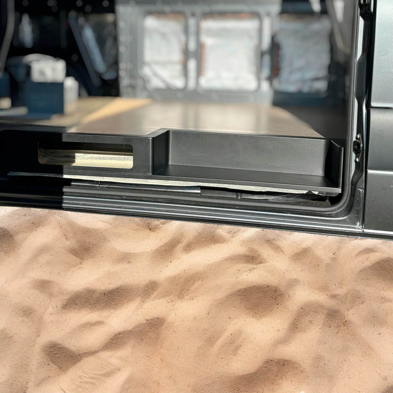 Detail of the premium powder-coated finish on the 2019+ Sprinter Sliding Door Storage Step, providing protection against corrosion and a stylish look.